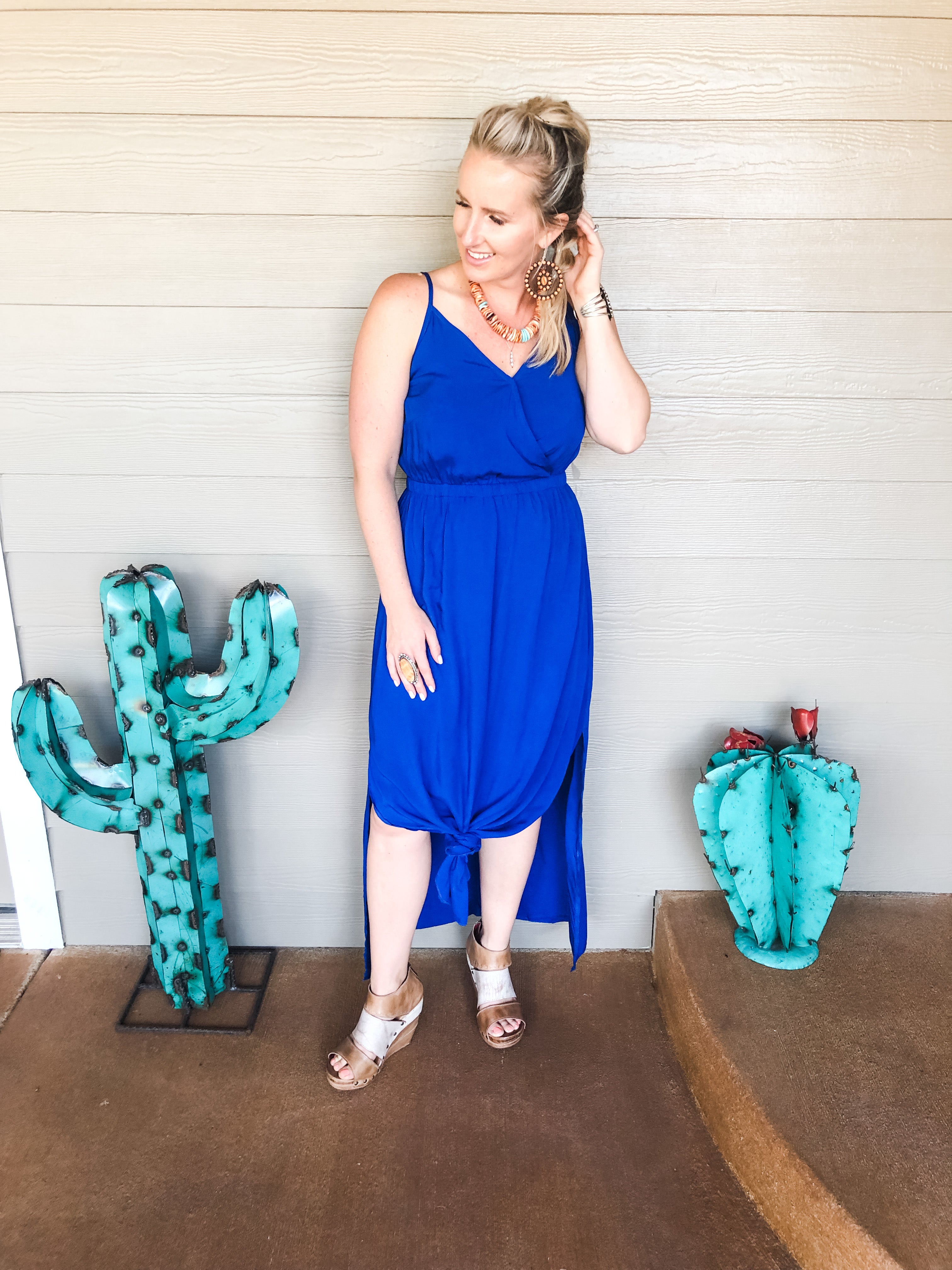 The Clara dress has a rich blue color sure to make you stand out