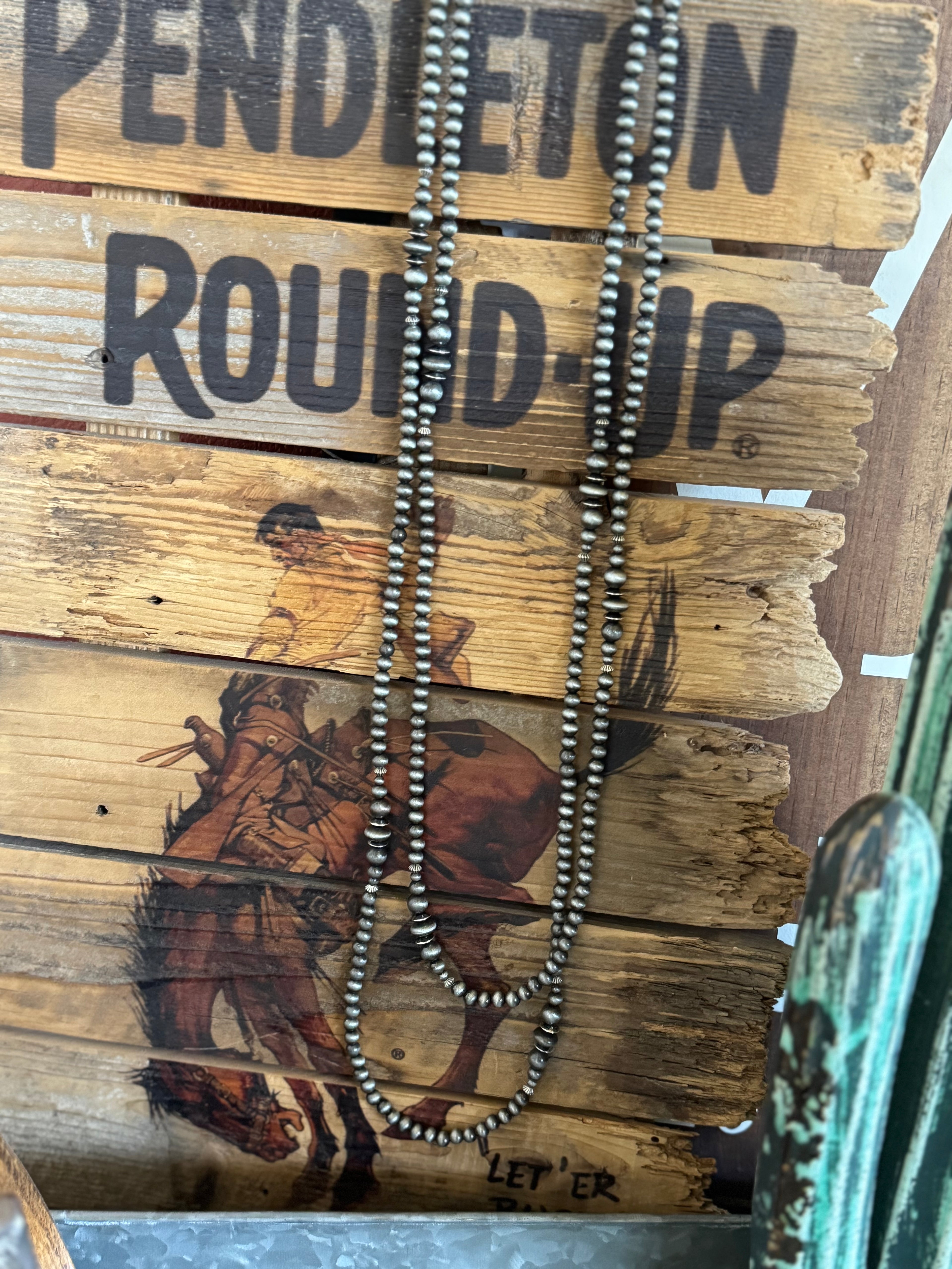 Long faux Navajo pearl necklace 