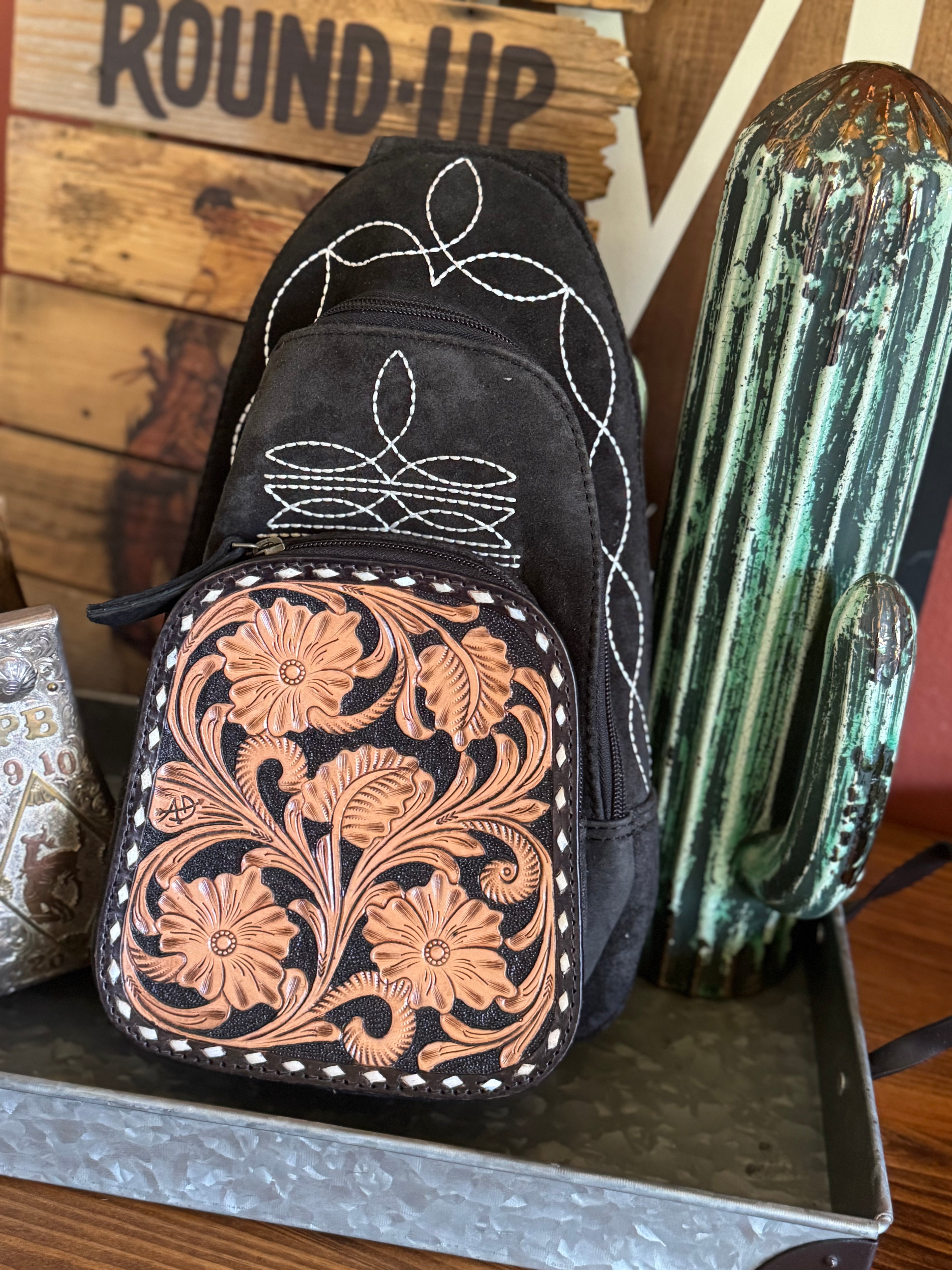 Tooled sling bag