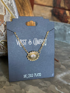 Gold concho necklace on a West & Company branded card with '18K Gold Plated' text.