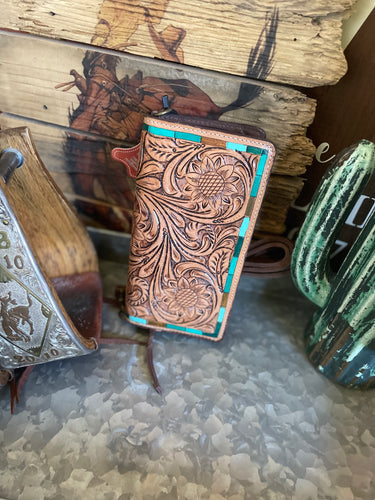 tooled leather clutch