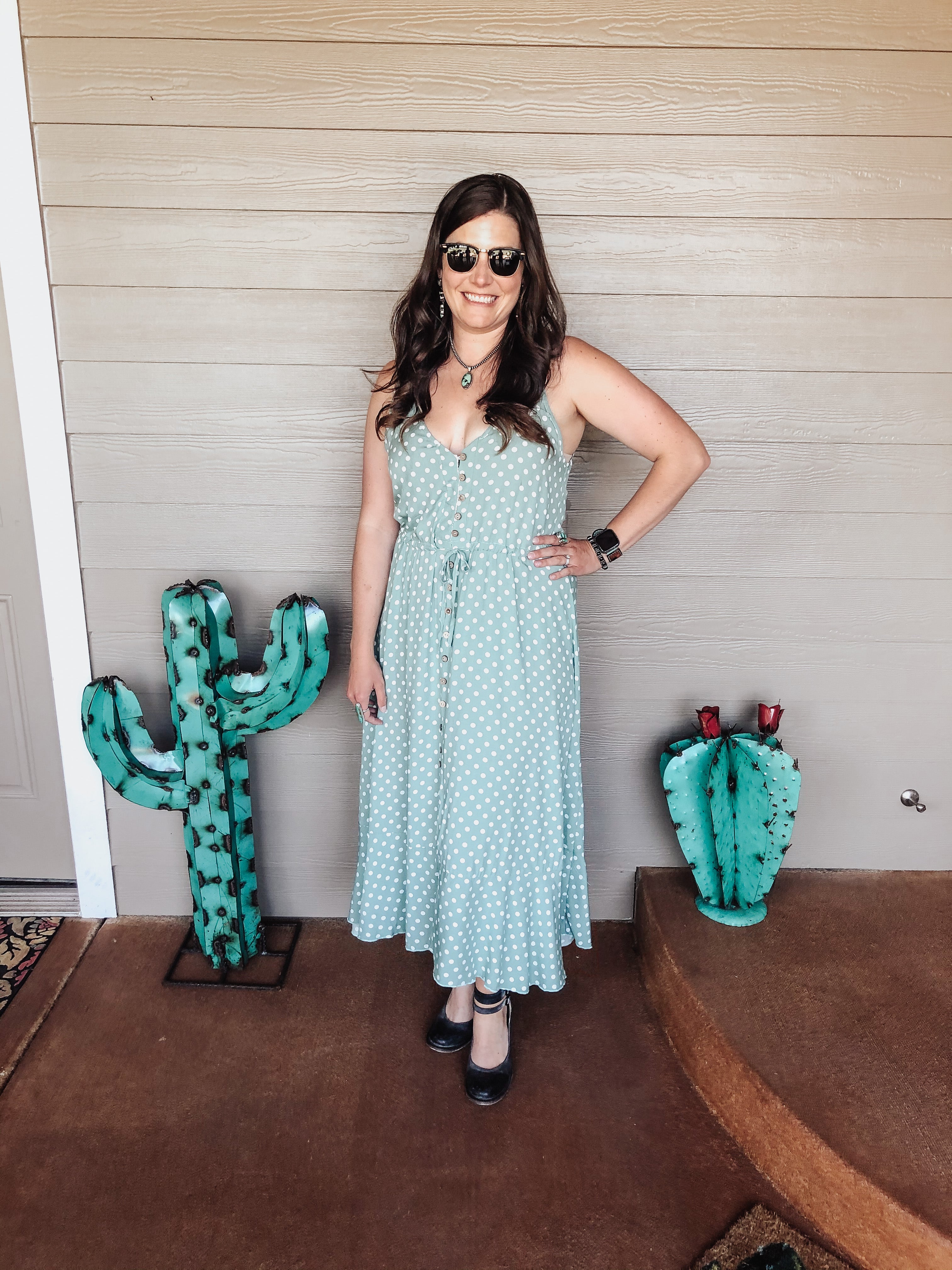 The Ella dress has is the cutest sage and polka dot dress